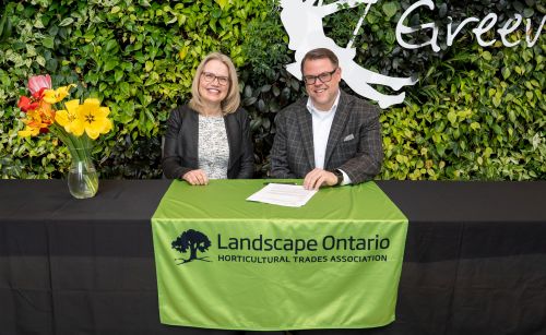 Landscape Ontario and the Electrical Safety Authority sign a partnership agreement in support of powerline safety.